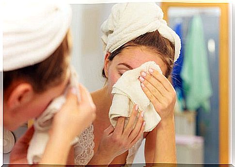 Woman removing makeup