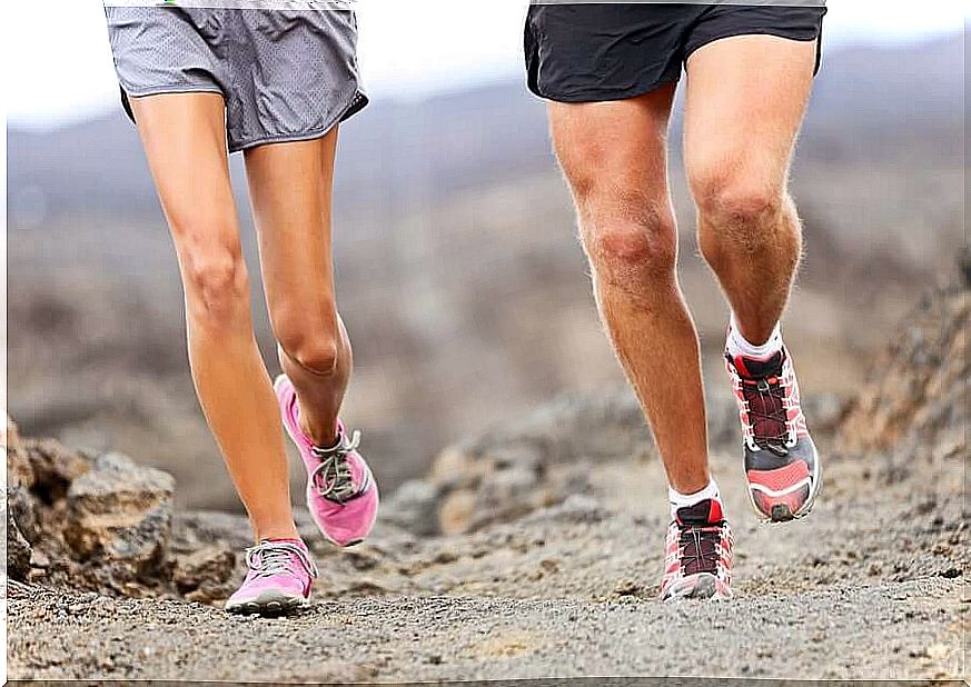 Couple running outdoors