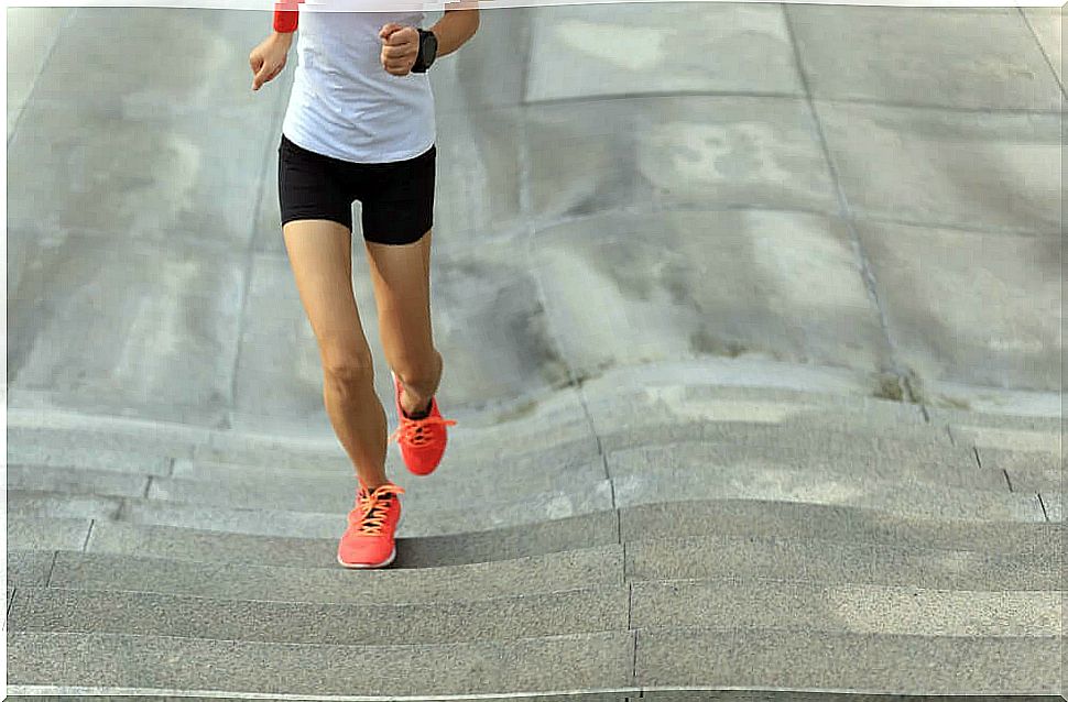 Girl jogging up stairs.