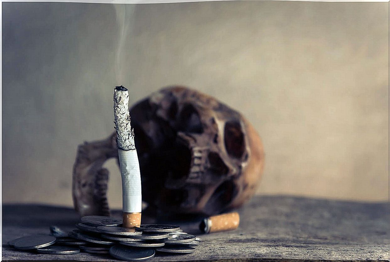 Cigarette, skull and coins.