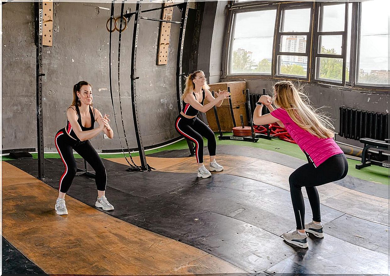 Women doing squats.