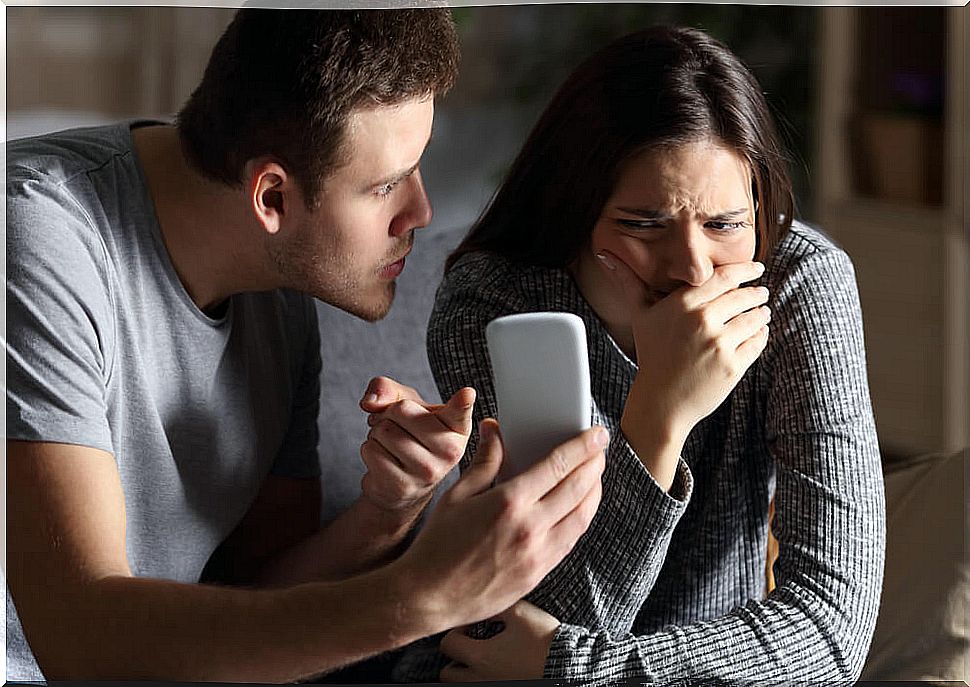 Boyfriend reproaching with mobile