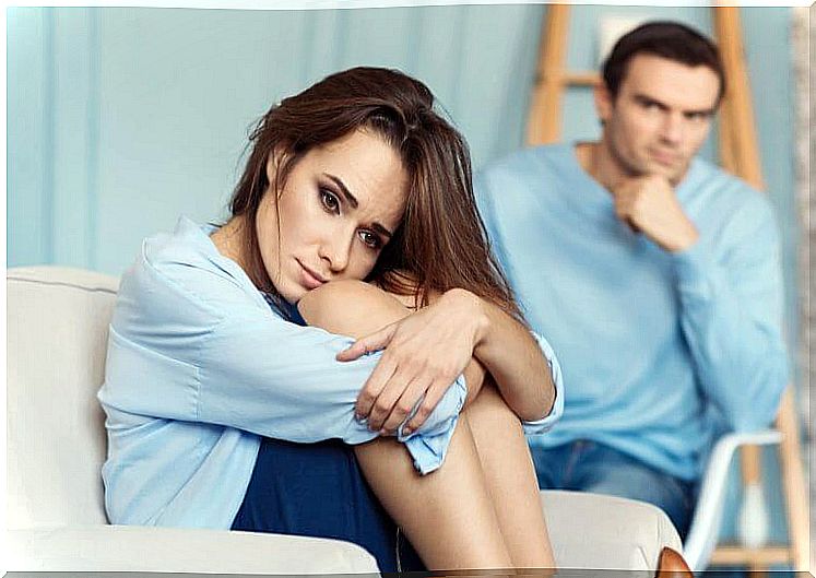 Man looking at his partner with sad expression