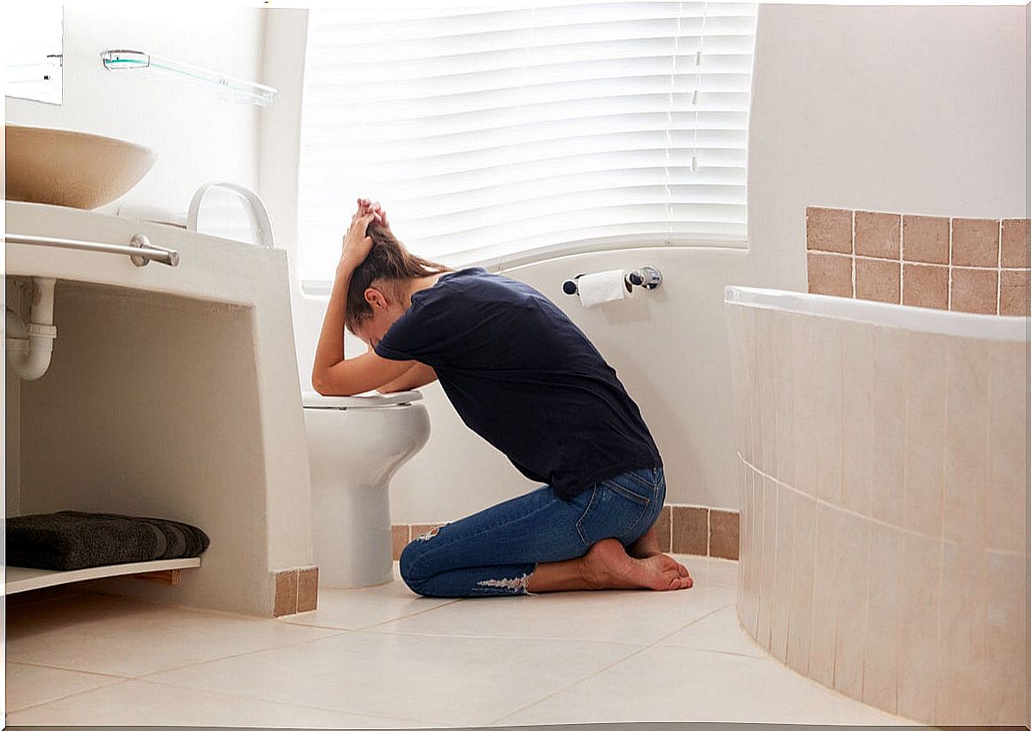 Woman with bulimia vomiting.