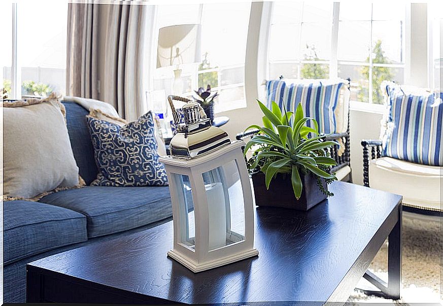 Wooden lantern on the table in a living room