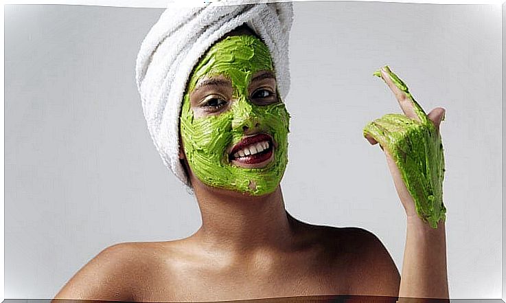 Woman wearing an avocado face mask