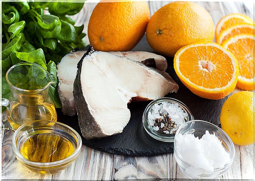 Pieces of cod with oranges, olive oil and salt