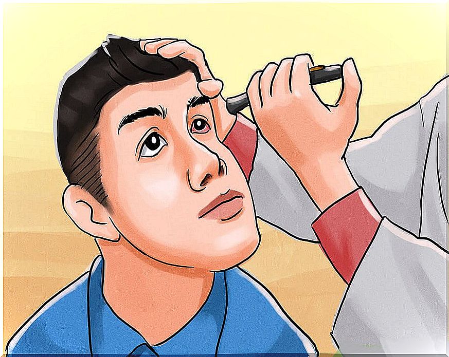 Doctor evaluating eye of patient